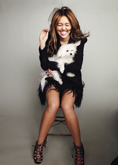 0401-miley-cyrus-dog-in-lap_lg.jpg